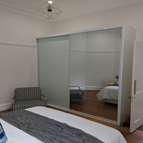 Frosted glass sliding door with mirror