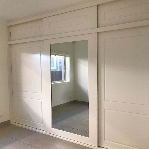DIY-Sliding-Profiled-Two-Panel-Polyurethane-Wardrobe-Doors-with-central-mirror-and-top-doors